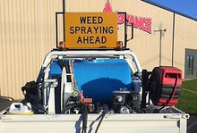 Load image into Gallery viewer, Ultimax Industries RoadBase Weed Spraying Ahead Pilot Vehicle Sign Kit Manual Version with Halogen Beacons and Folding Sign Mounted on Ute
